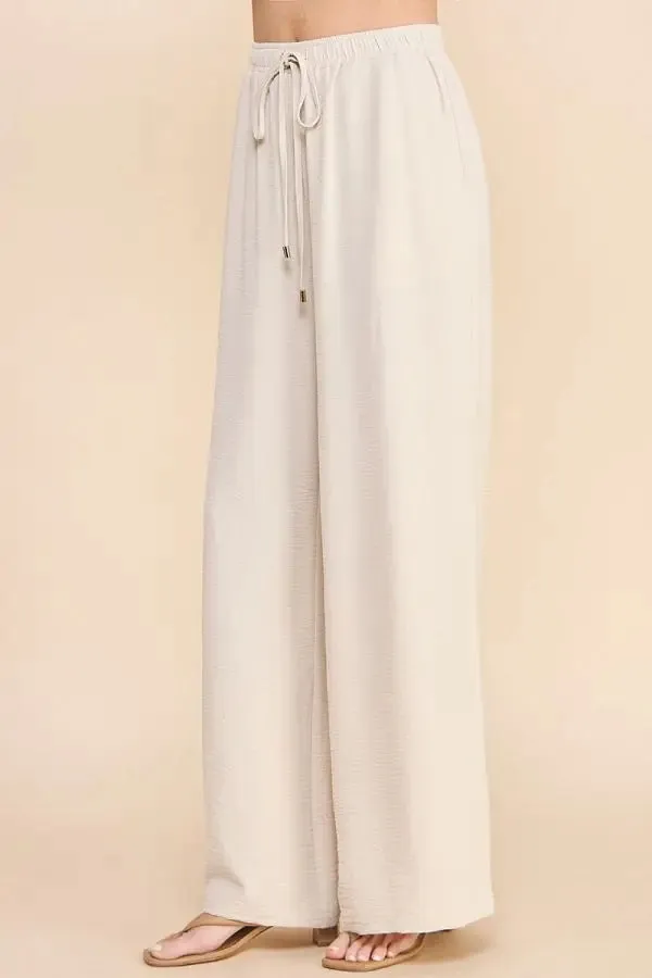 AIRY DRAWSTRING PANTS WITH POCKETS