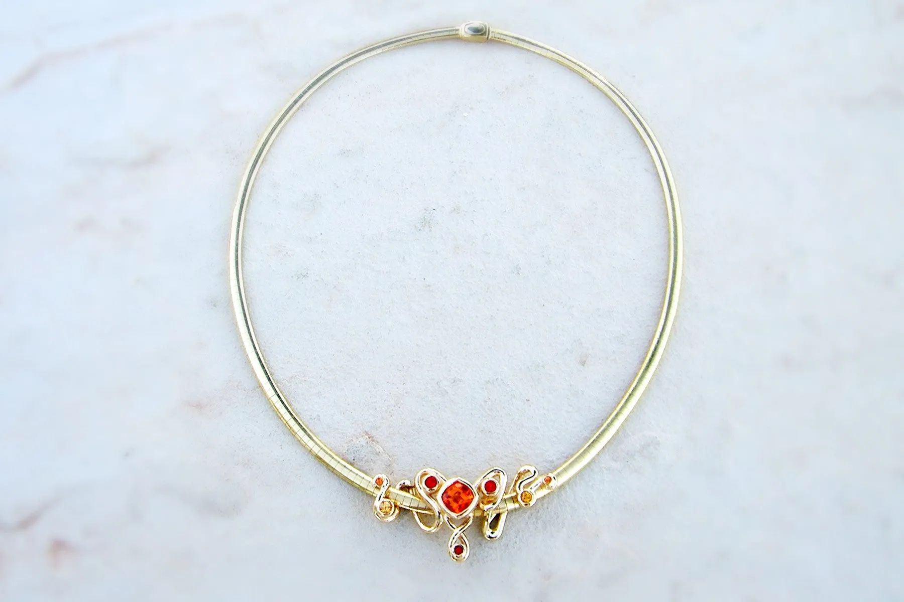 Artistic Orange Sapphire Omega Necklace