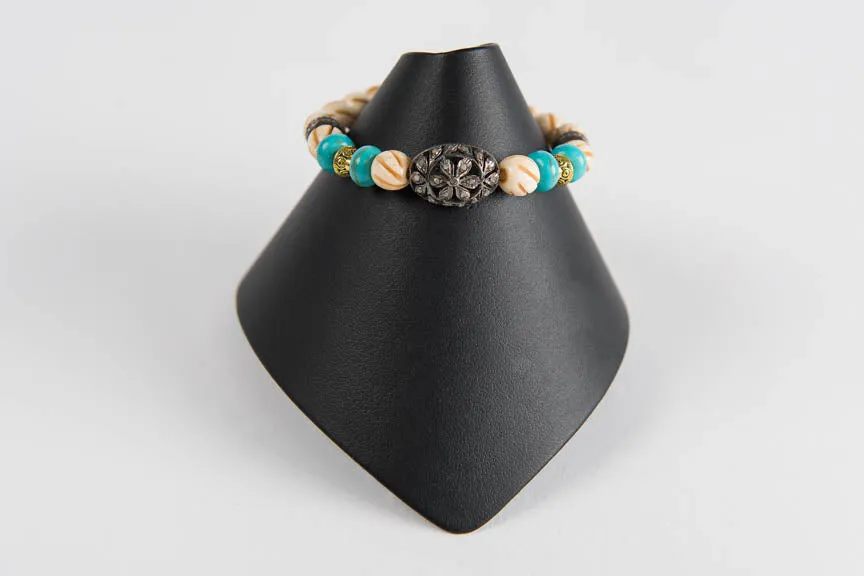 Carved bone and turquoise with pave diamond bead