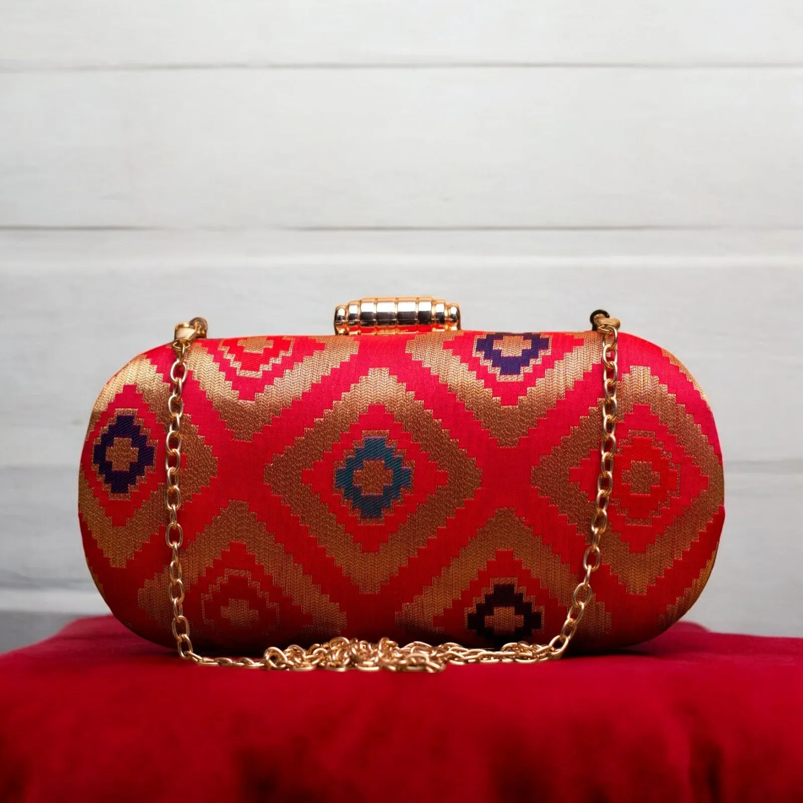 Exclusive Red Zari Clutch with Cylindrical Shape