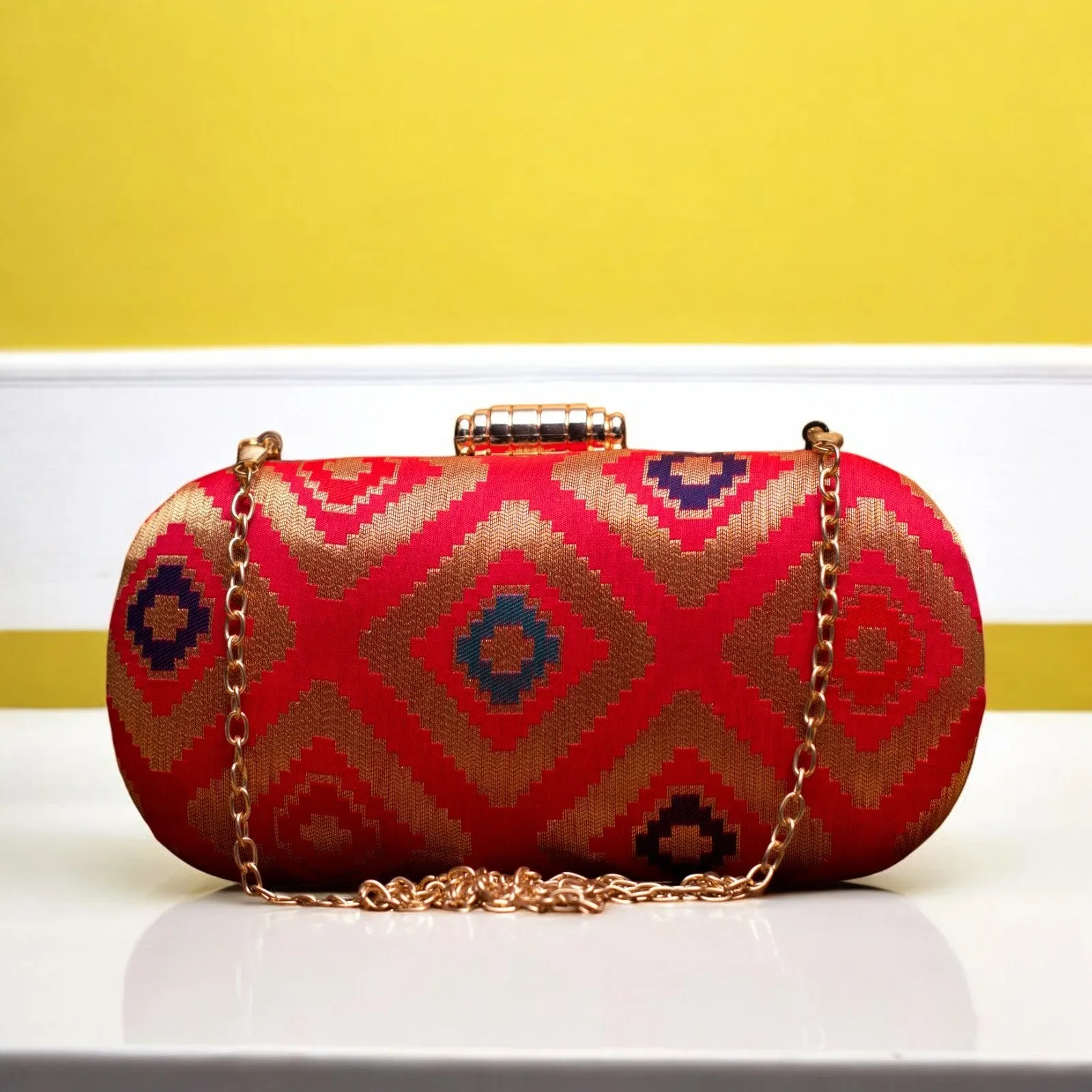 Exclusive Red Zari Clutch with Cylindrical Shape