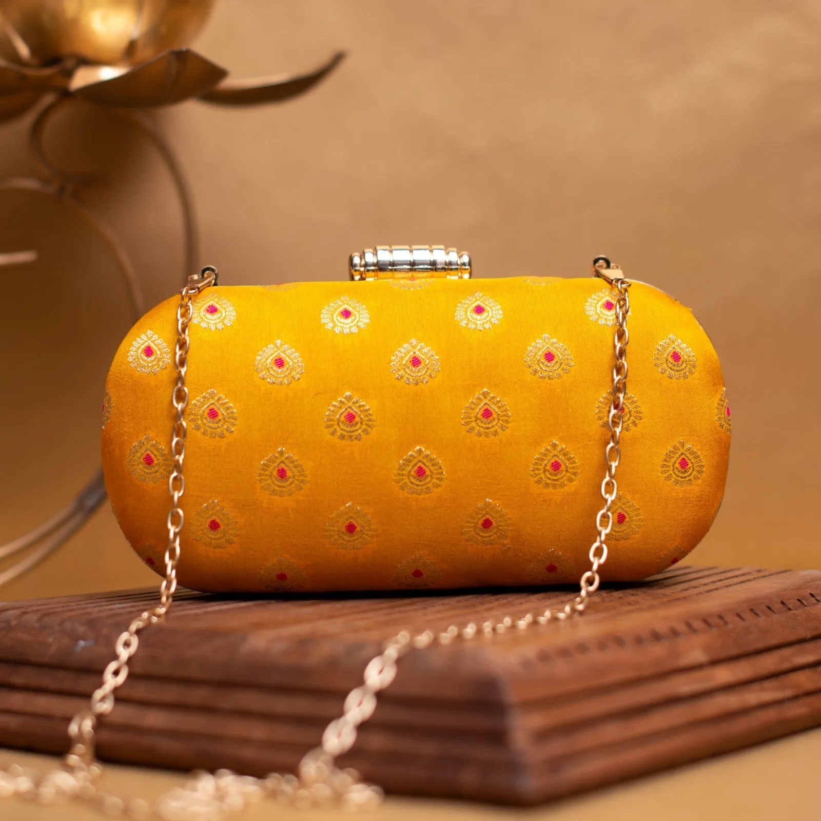 Exclusive Yellow Zari cylindrical Shape Clutch