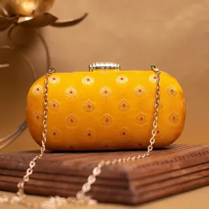 Exclusive Yellow Zari cylindrical Shape Clutch