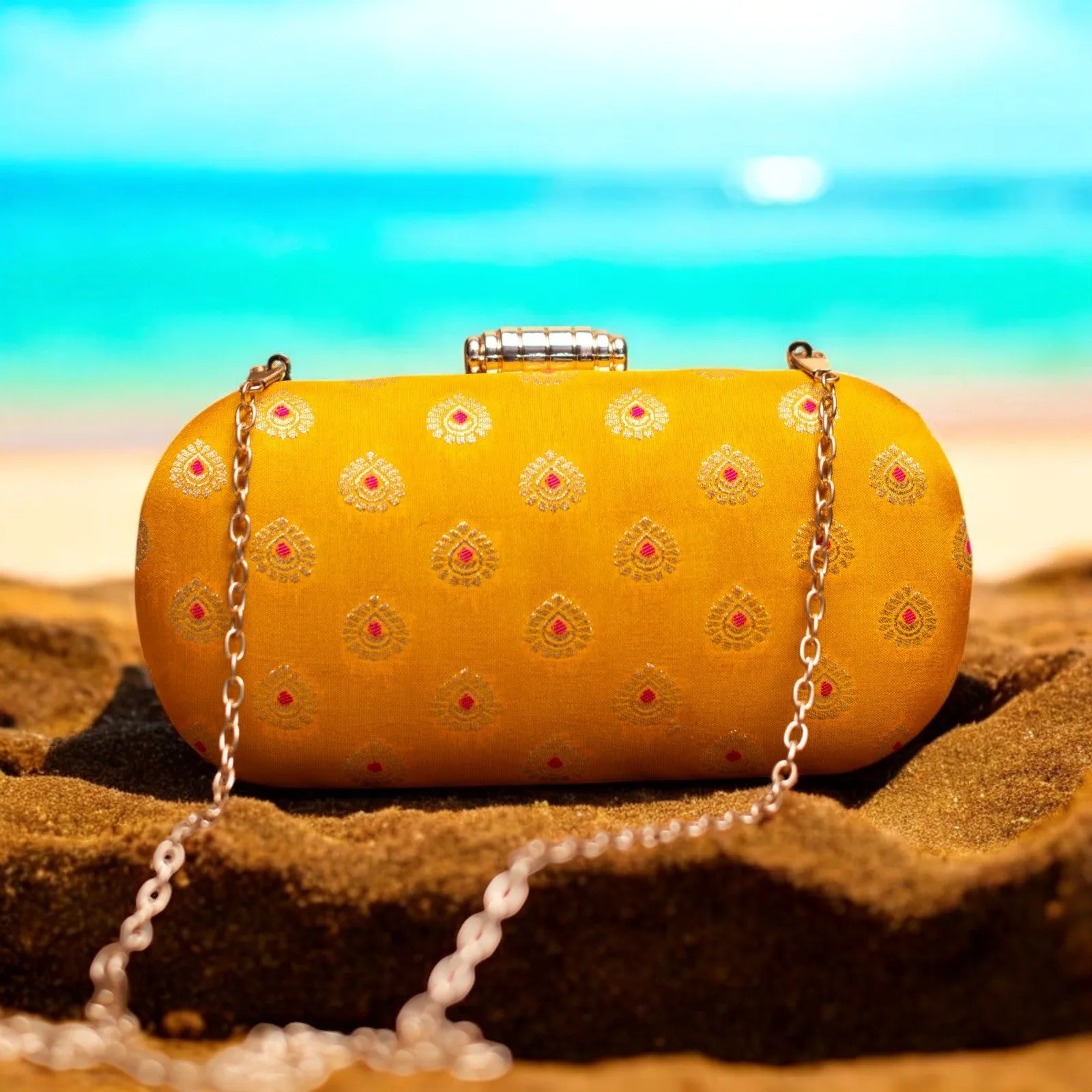 Exclusive Yellow Zari cylindrical Shape Clutch
