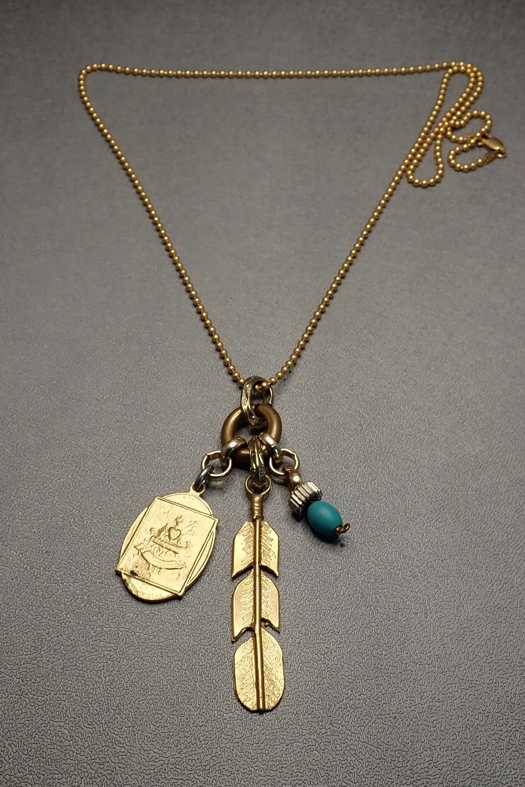FEATHER & TURQUOISE PENDANT