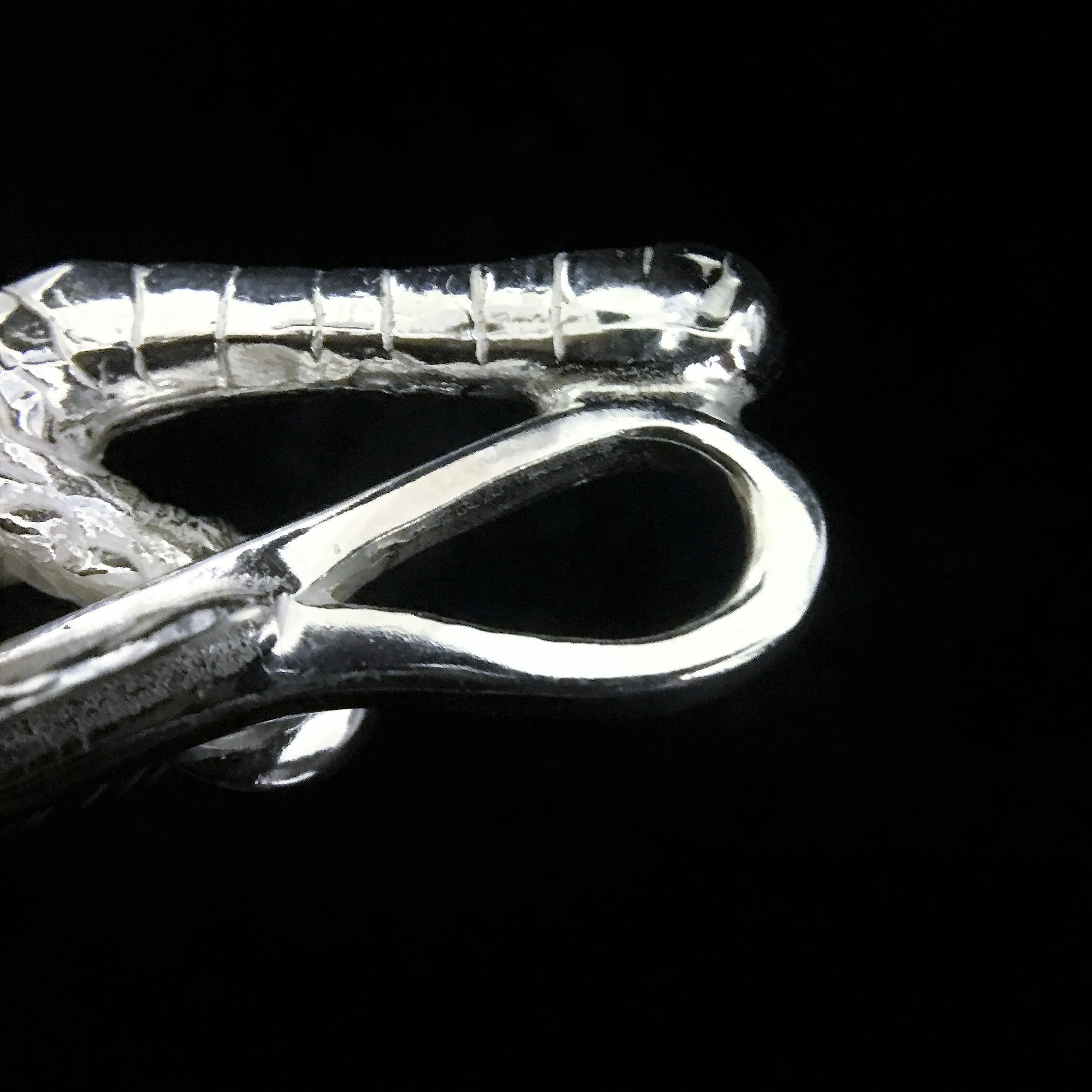 Goros Feather With Silver Claw - Facing Right