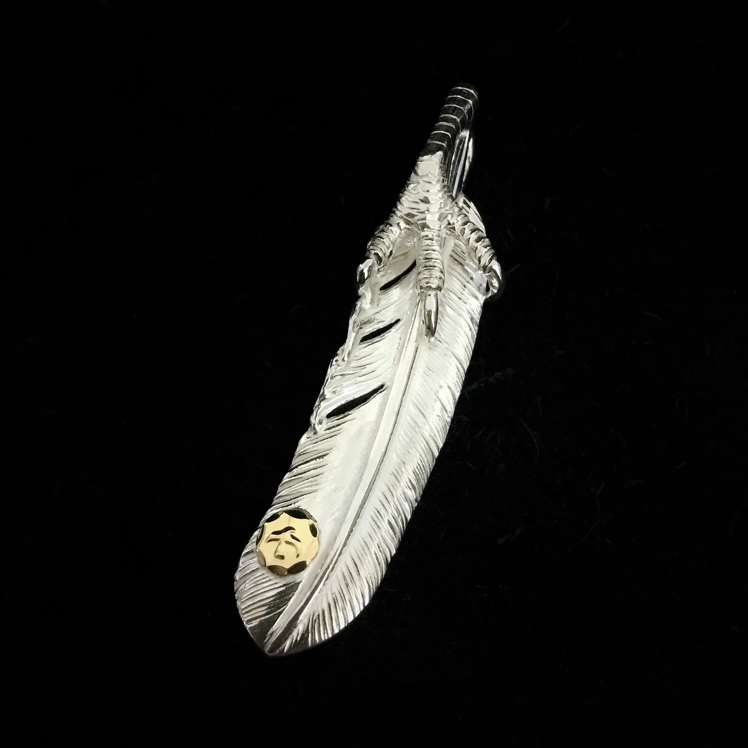Goros Feather With Silver Claw - Facing Right