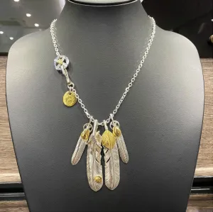 Goros Feather With Silver Claw (Left) (Xl) & Gold Top Feather (Right) (Xl) Setup